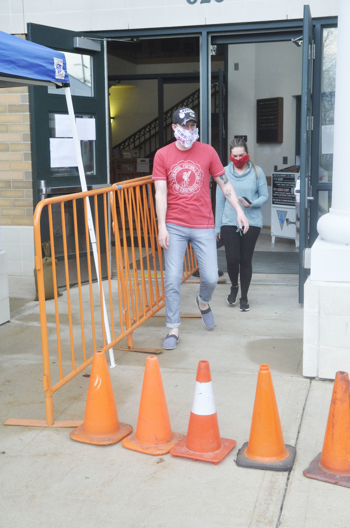 Husband and wife voters exit Lake Geneva City Hall
